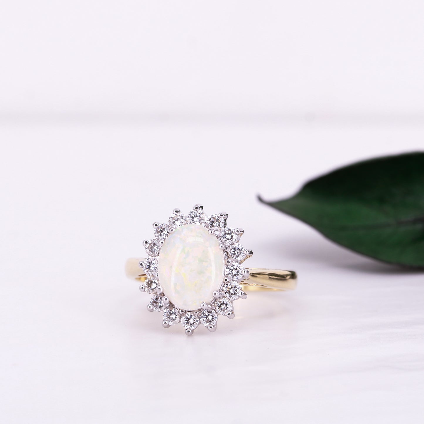 Opal and Diamond Halo Ring 18ct Yellow Gold