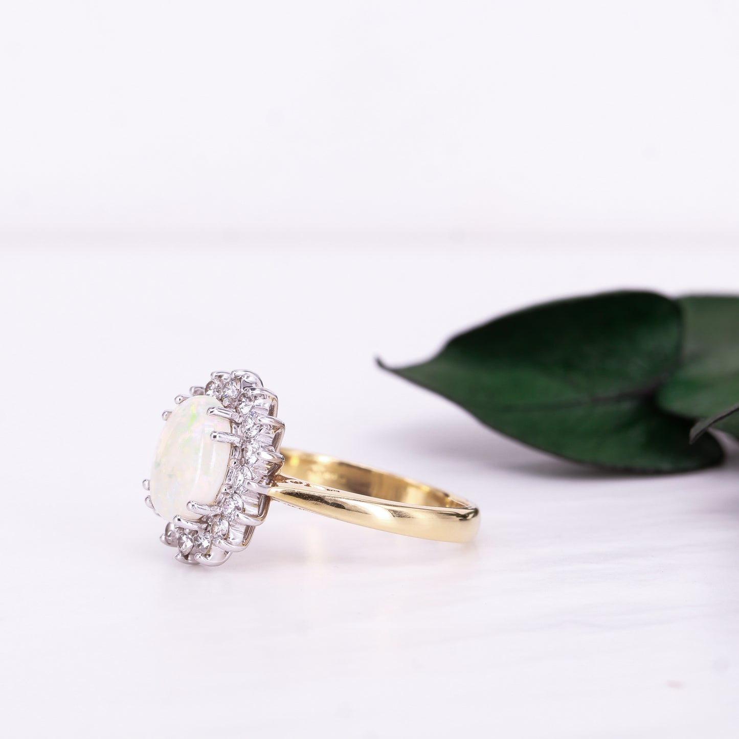 Opal and Diamond Halo Ring 18ct Yellow Gold