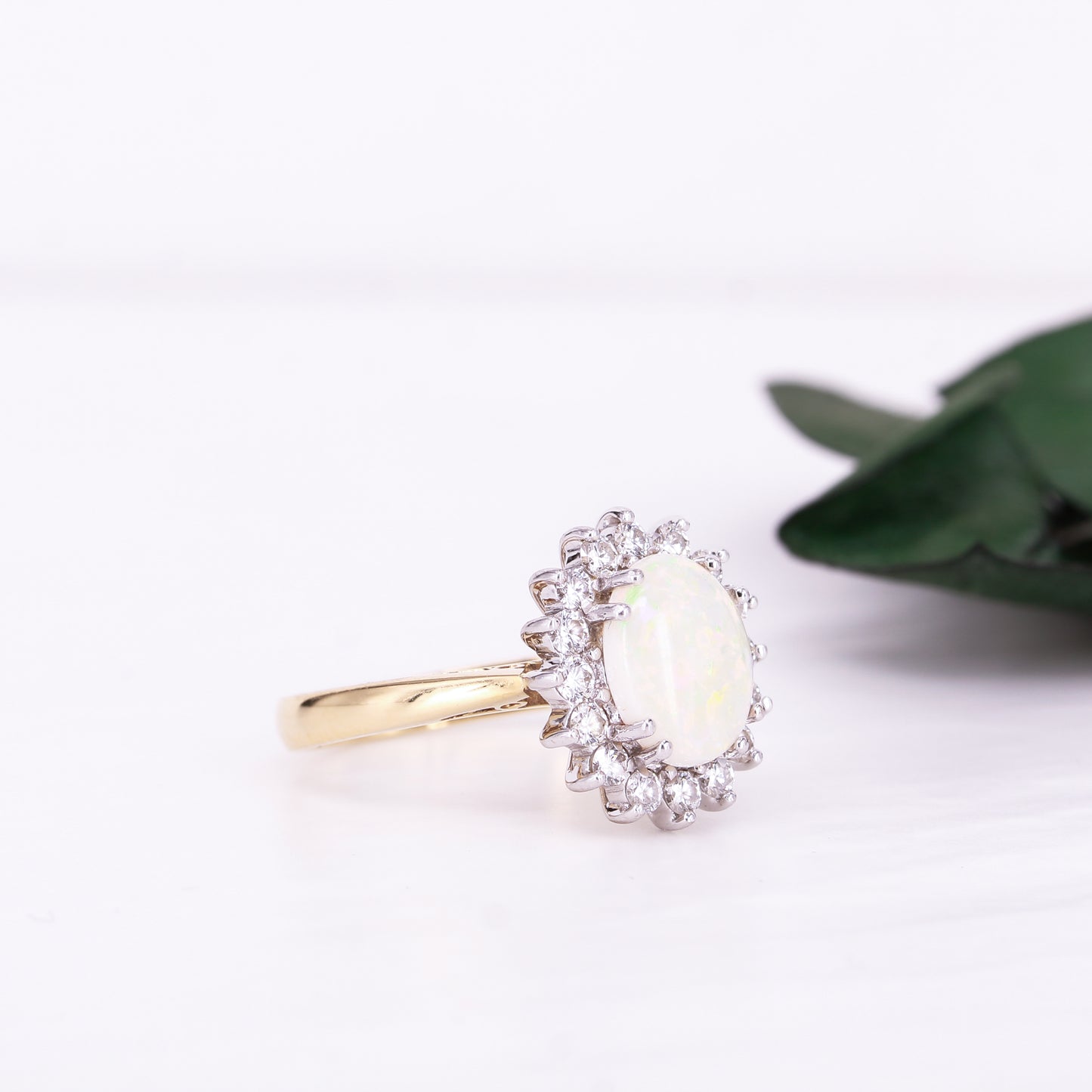 Opal and Diamond Halo Ring 18ct Yellow Gold