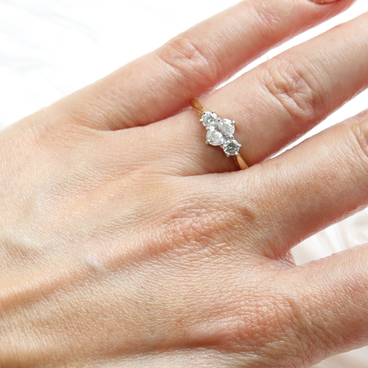 18ct yellow gold oval diamond engagement ring. Three stone oval diamond engagement ring.
