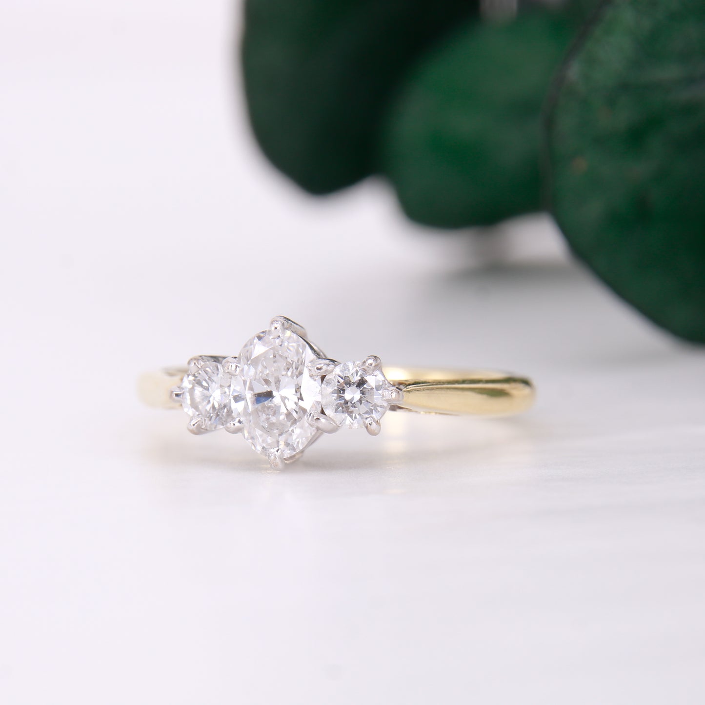18ct yellow gold oval diamond engagement ring. Three stone oval diamond engagement ring.