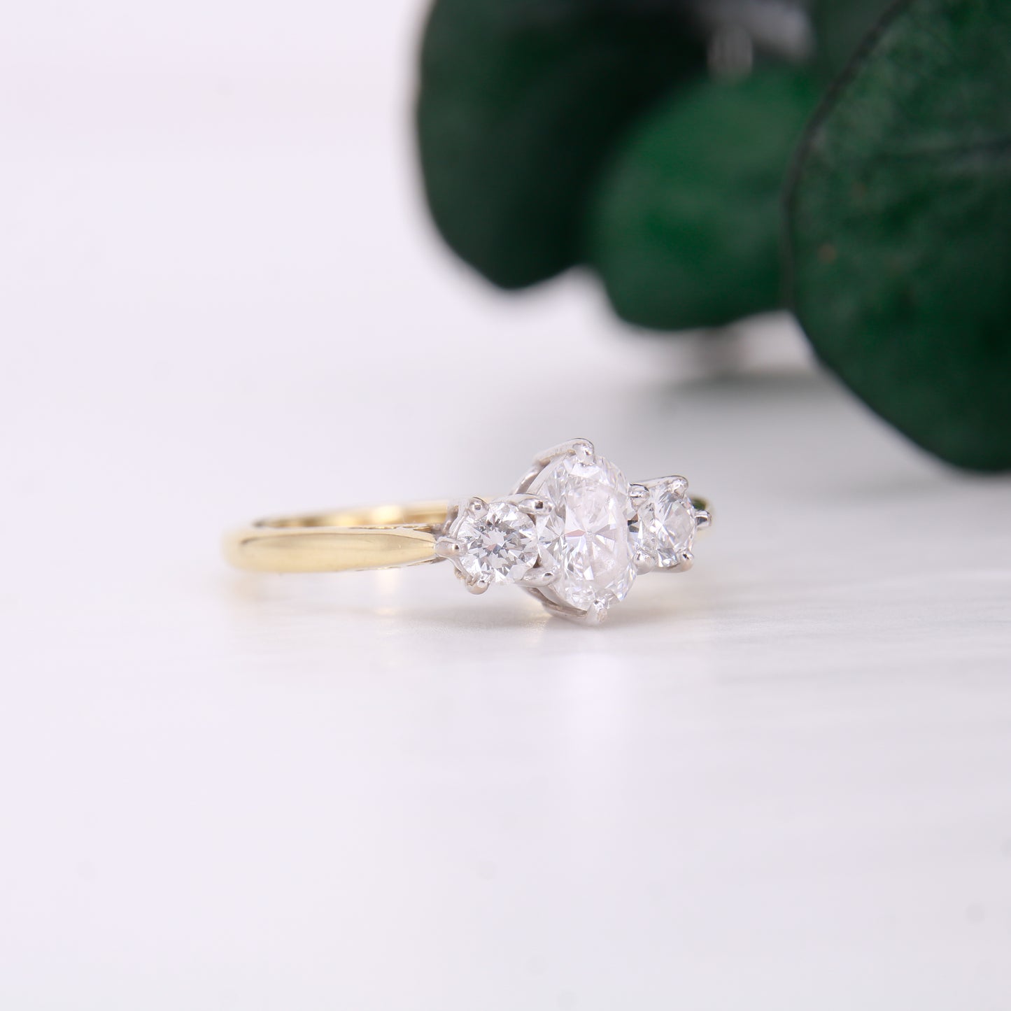 18ct yellow gold oval diamond engagement ring. Three stone oval diamond engagement ring.