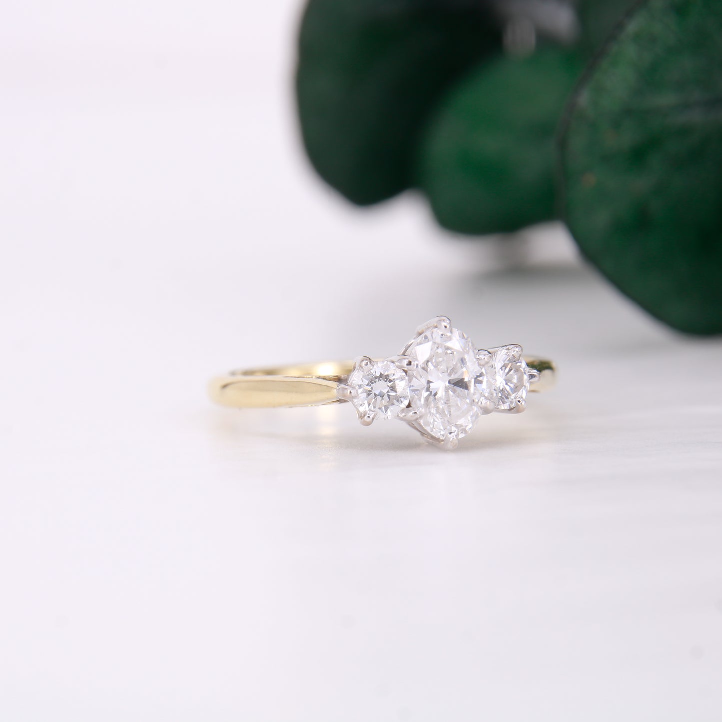 18ct yellow gold oval diamond engagement ring. Three stone oval diamond engagement ring.