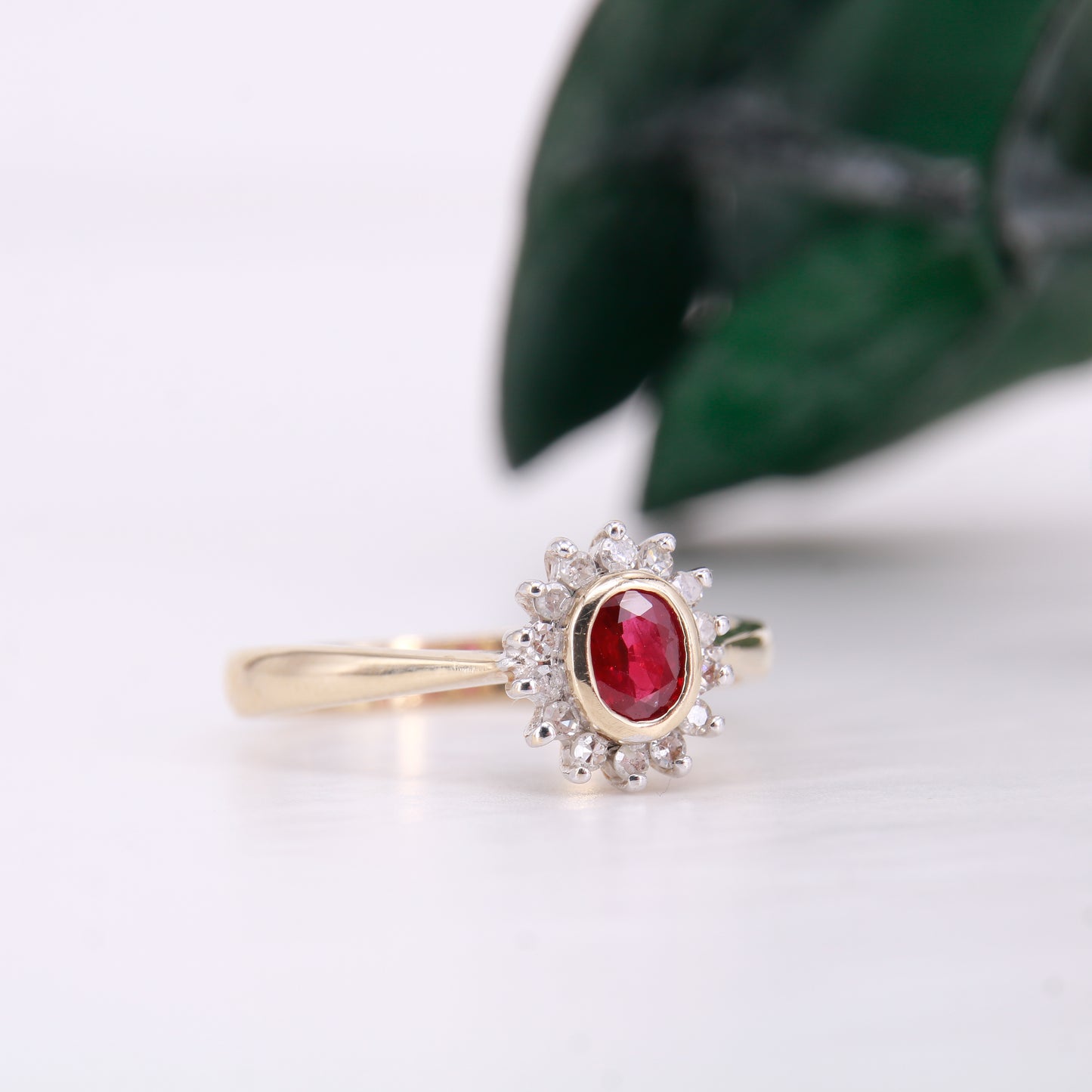 Vintage Garnet and Diamond Ring, Oval Cut Garnet surrounded by a halo of diamonds set in 9ct yellow gold. January birthstone engagement ring.