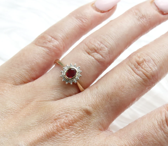 9ct Yellow Gold Oval Cut Garnet and Diamond Halo Ring