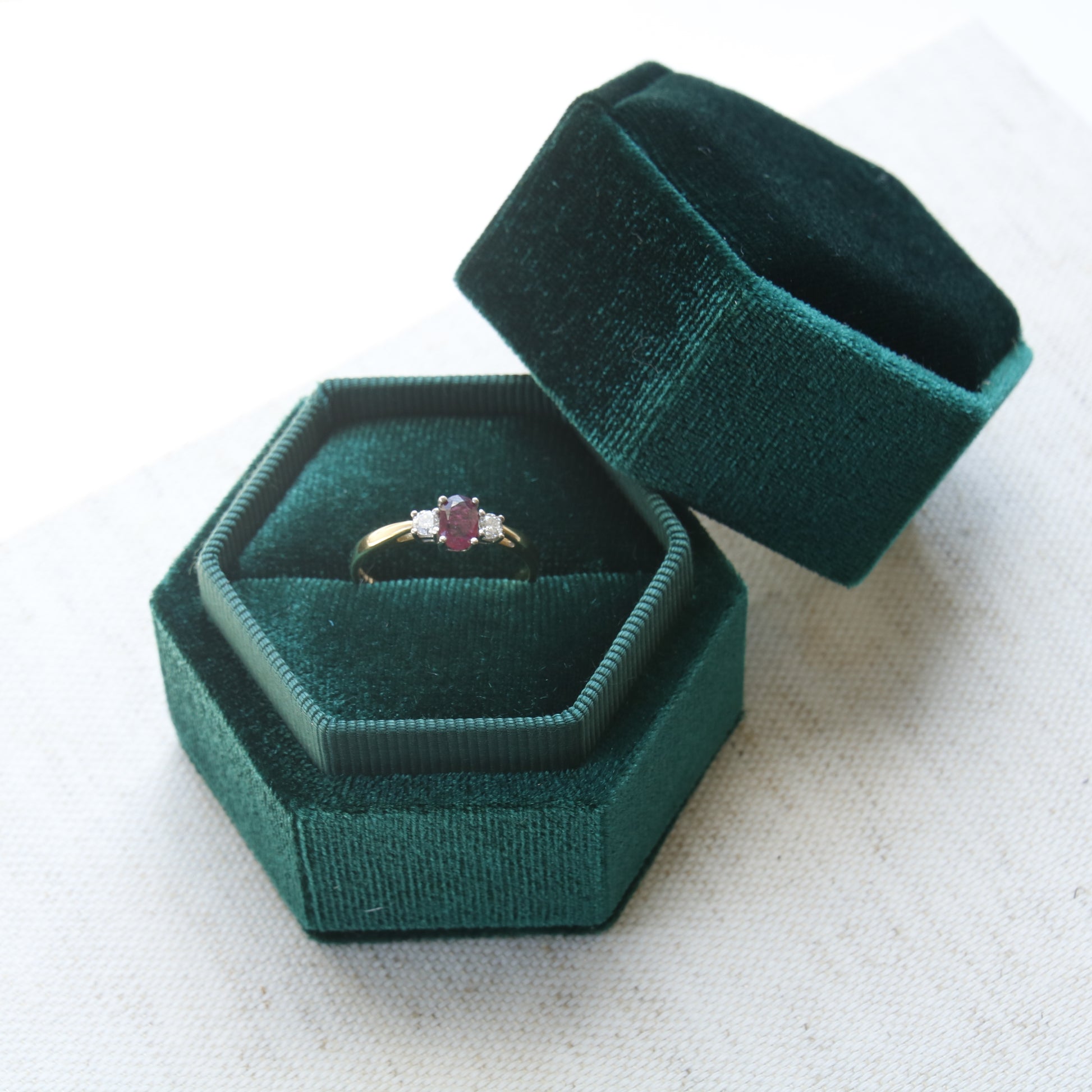 Preowned Oval cut Ruby and Diamond Trilogy Three Stone Engagement Ring