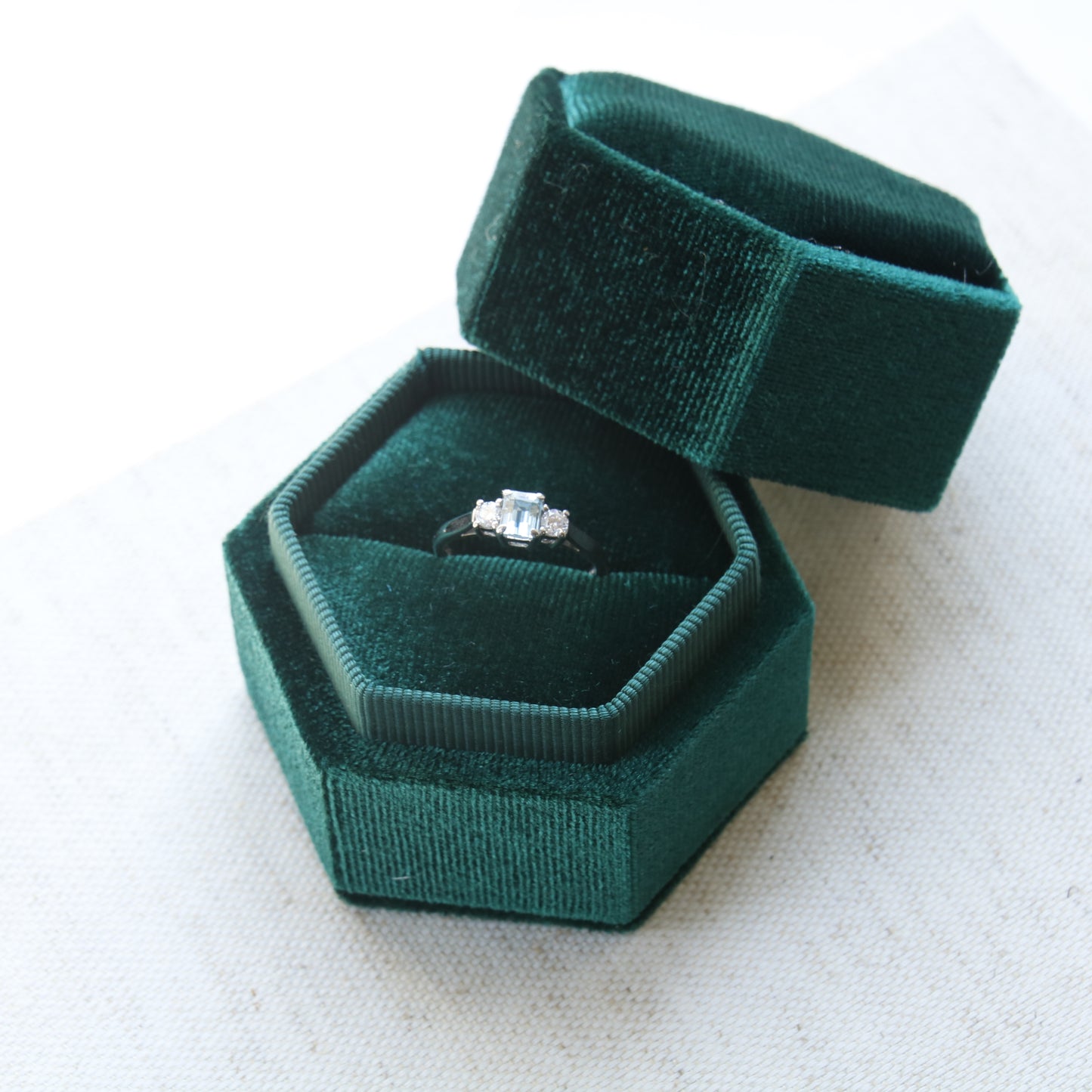 Preowned secondhand aquamarine and diamond three stone ring. 