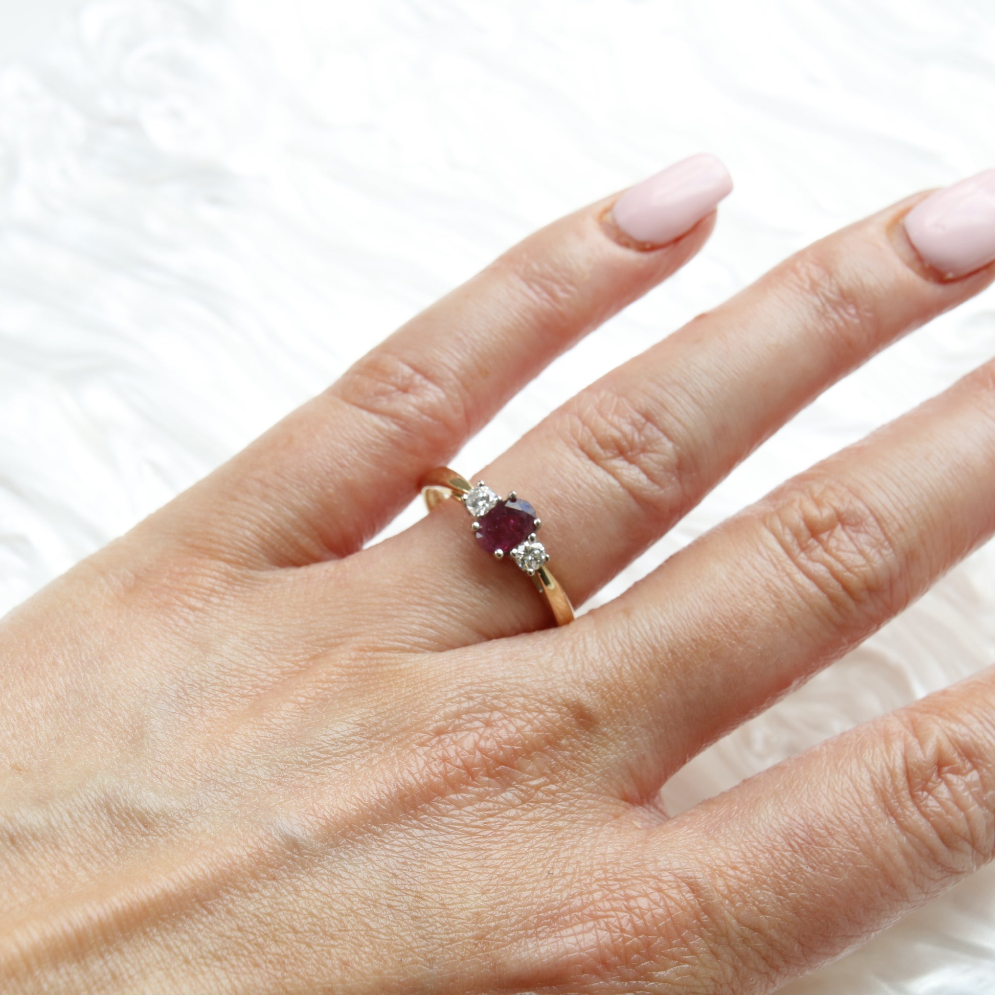 Preowned Oval cut Ruby and Diamond Trilogy Three Stone Engagement Ring