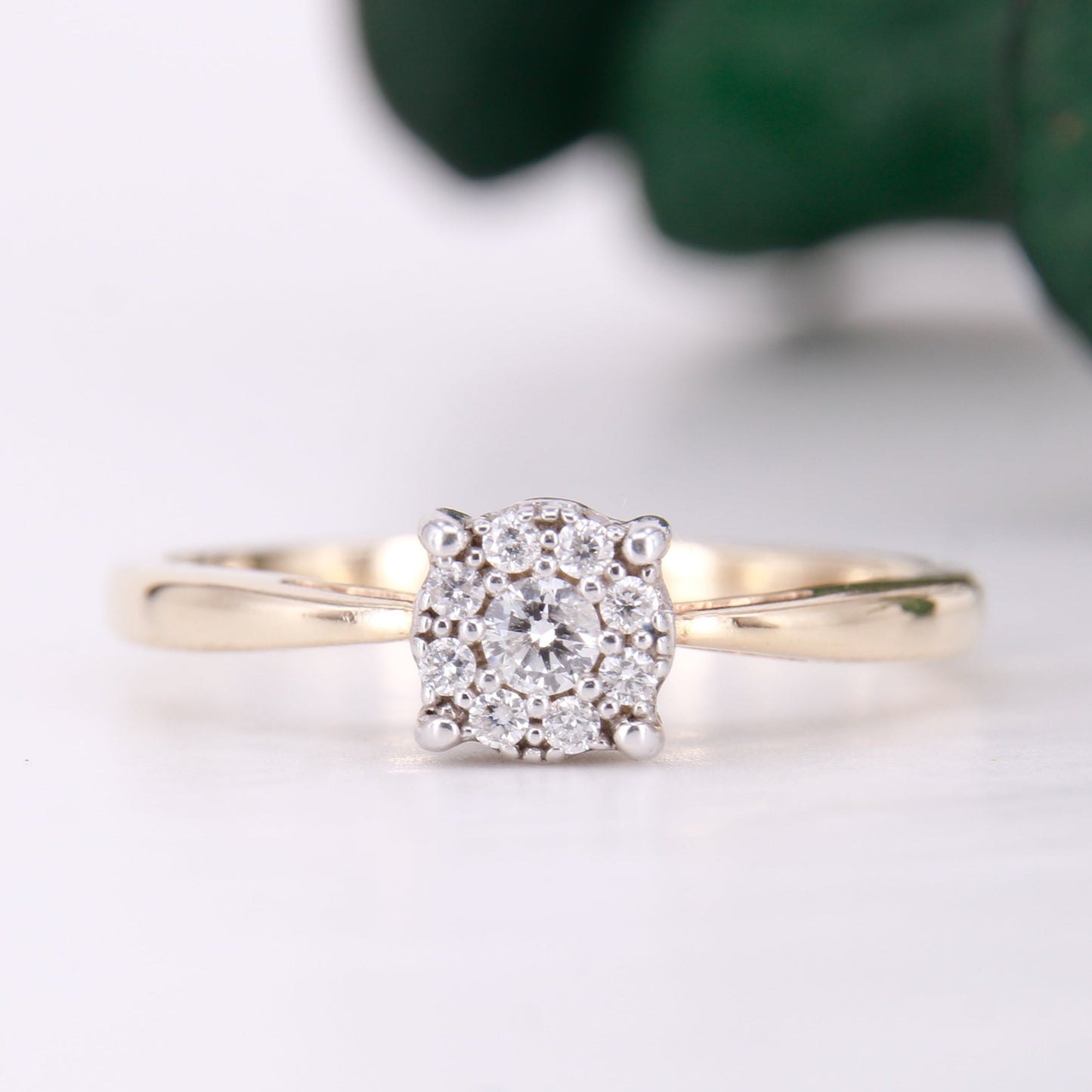 Preowned diamond cluster ring. Made up of 9 round brilliant cut diamonds each of excellent colour and clarity this ring sparkles perfectly.