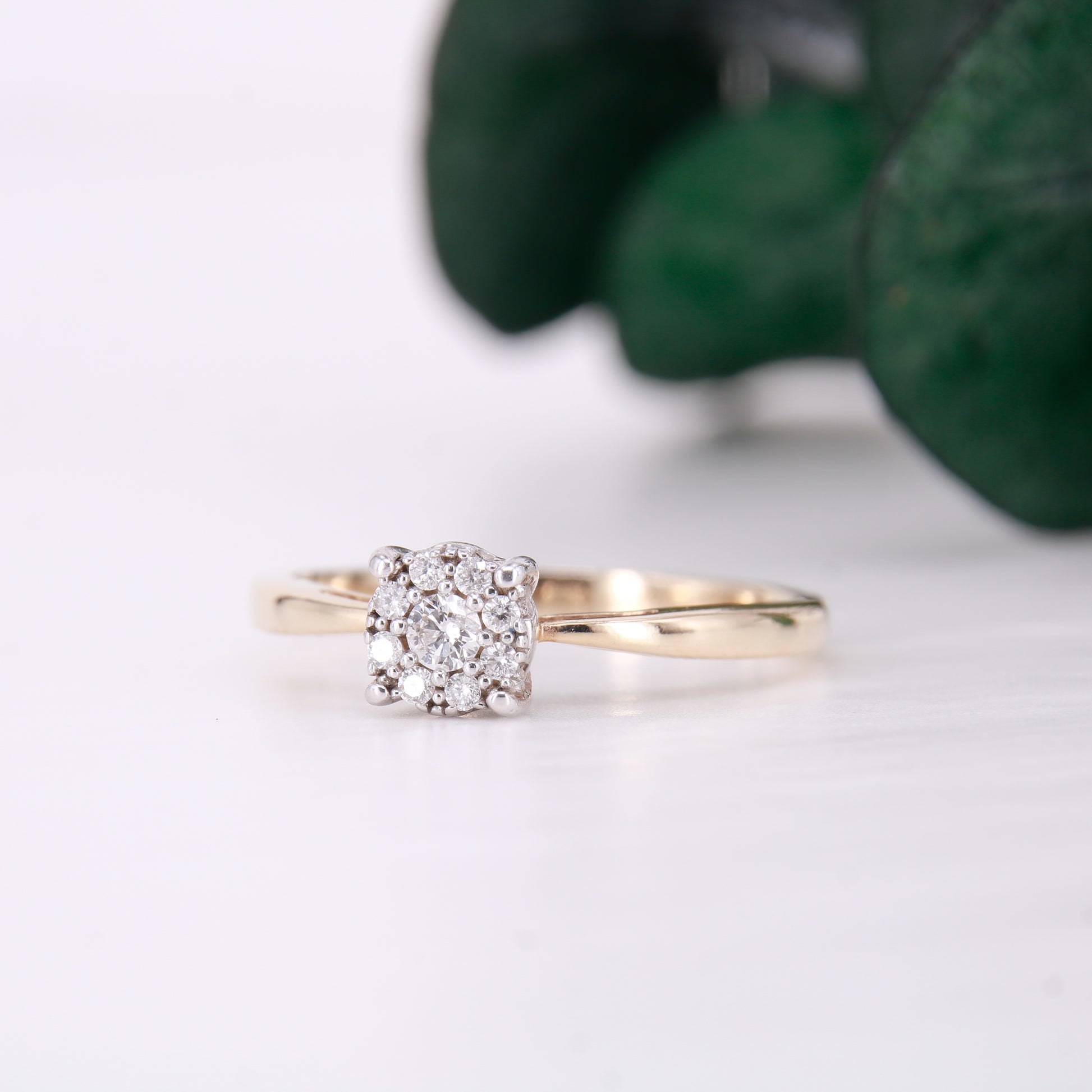 Preowned diamond cluster ring. Made up of 9 round brilliant cut diamonds each of excellent colour and clarity this ring sparkles perfectly.