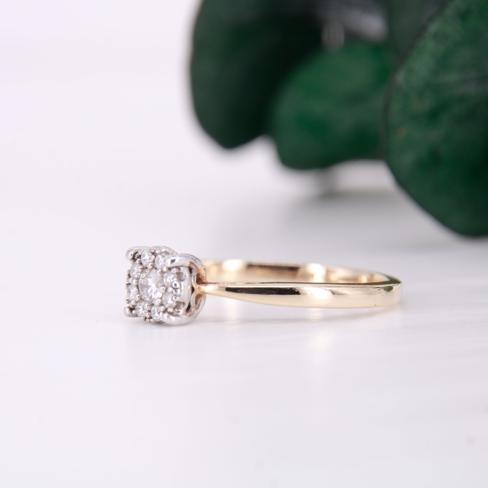 Preowned diamond cluster ring. Made up of 9 round brilliant cut diamonds each of excellent colour and clarity this ring sparkles perfectly.