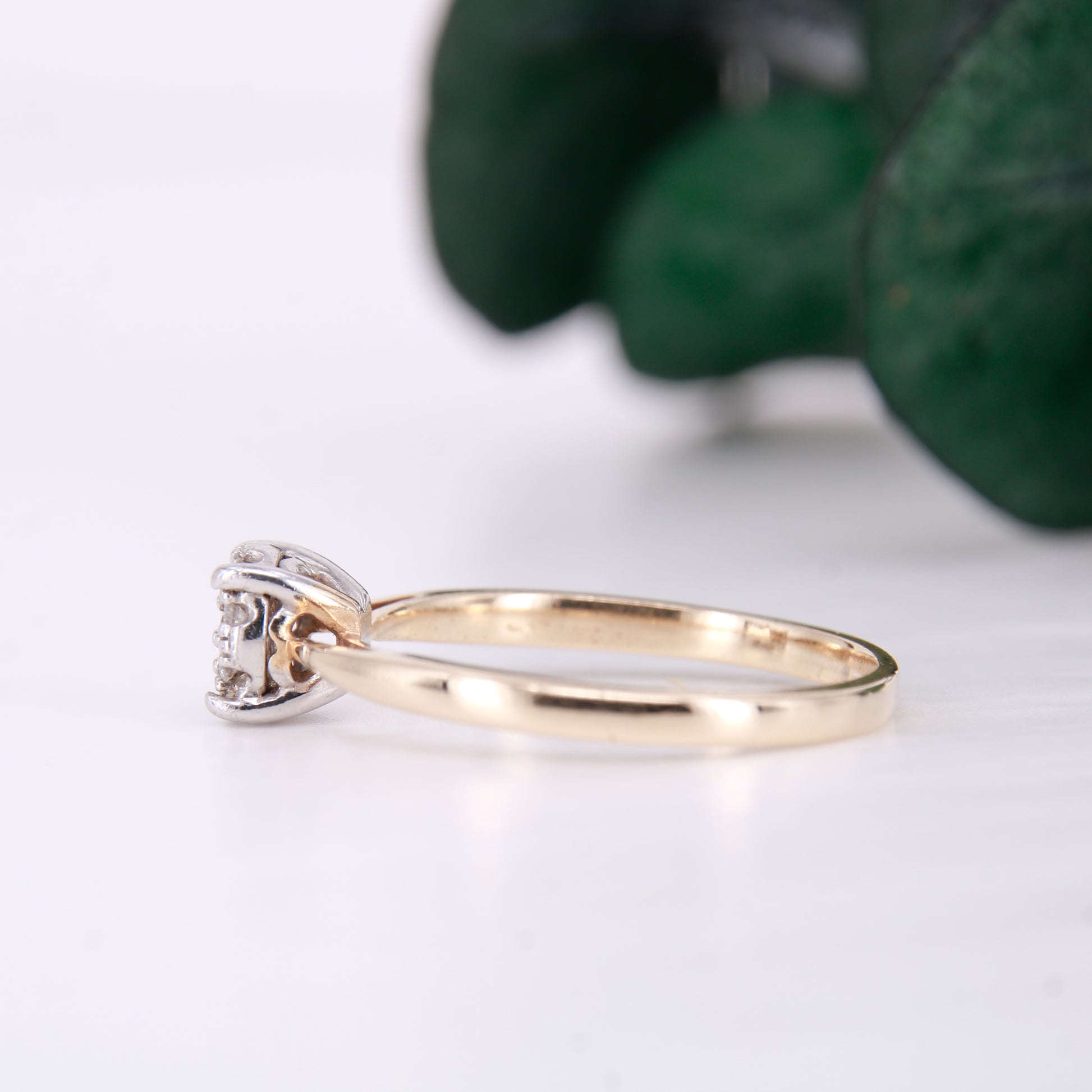 Preowned diamond cluster ring. Made up of 9 round brilliant cut diamonds each of excellent colour and clarity this ring sparkles perfectly.