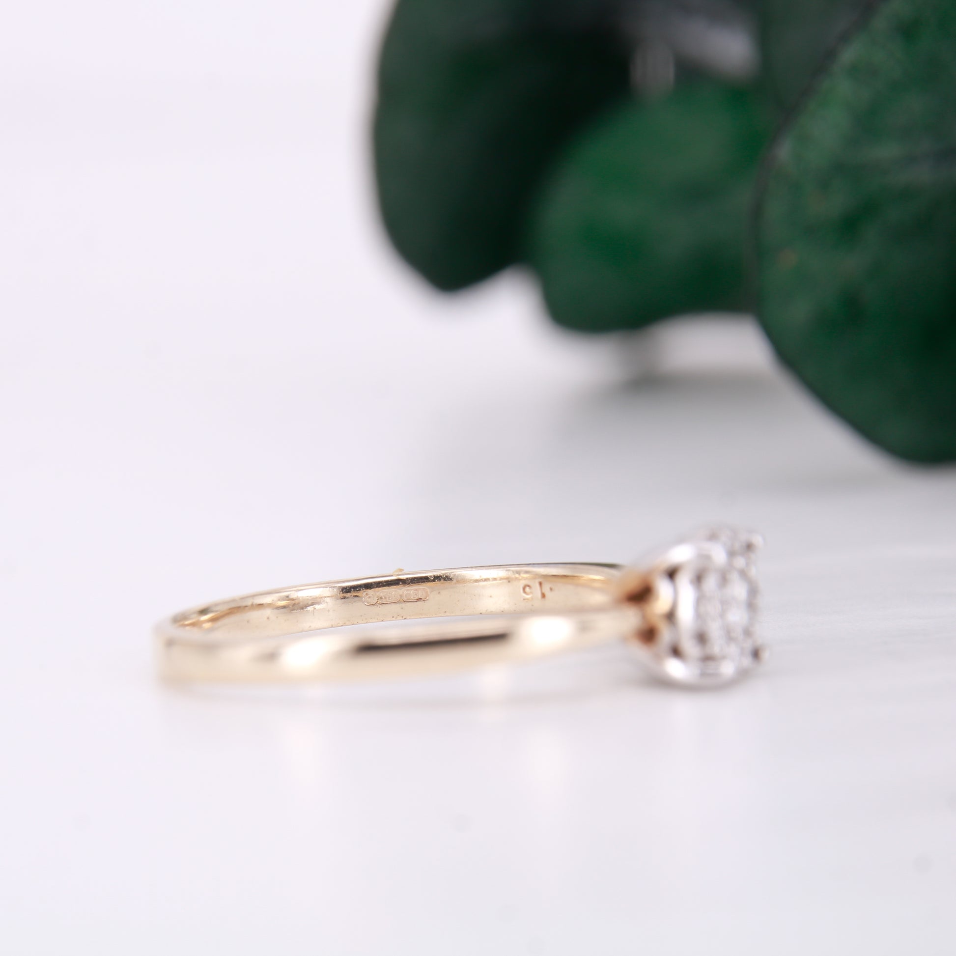 Preowned diamond cluster ring. Made up of 9 round brilliant cut diamonds each of excellent colour and clarity this ring sparkles perfectly.