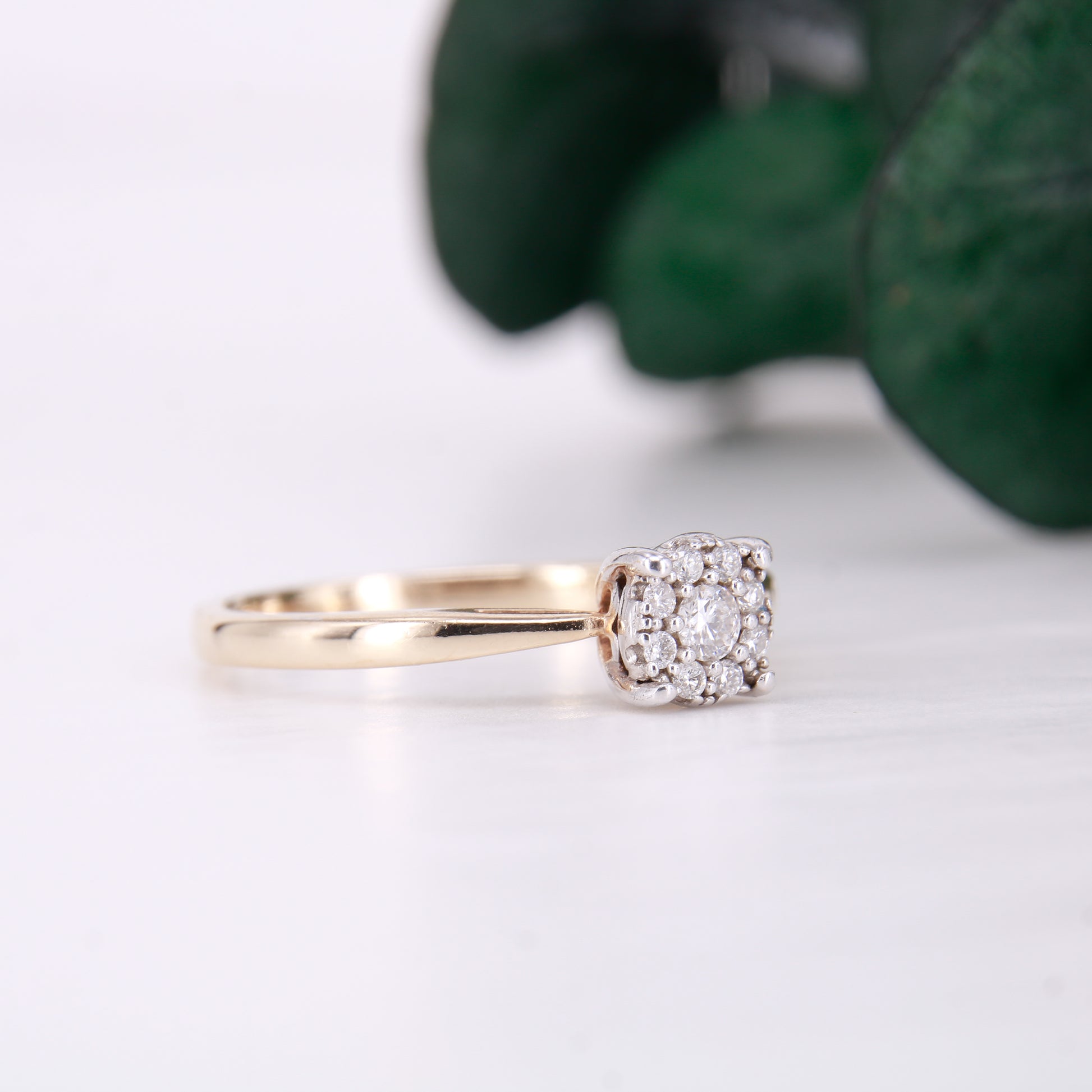 Preowned diamond cluster ring. Made up of 9 round brilliant cut diamonds each of excellent colour and clarity this ring sparkles perfectly.