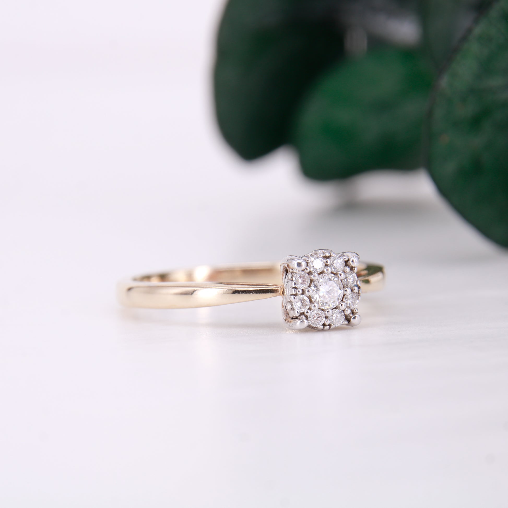 Preowned diamond cluster ring. Made up of 9 round brilliant cut diamonds each of excellent colour and clarity this ring sparkles perfectly.
