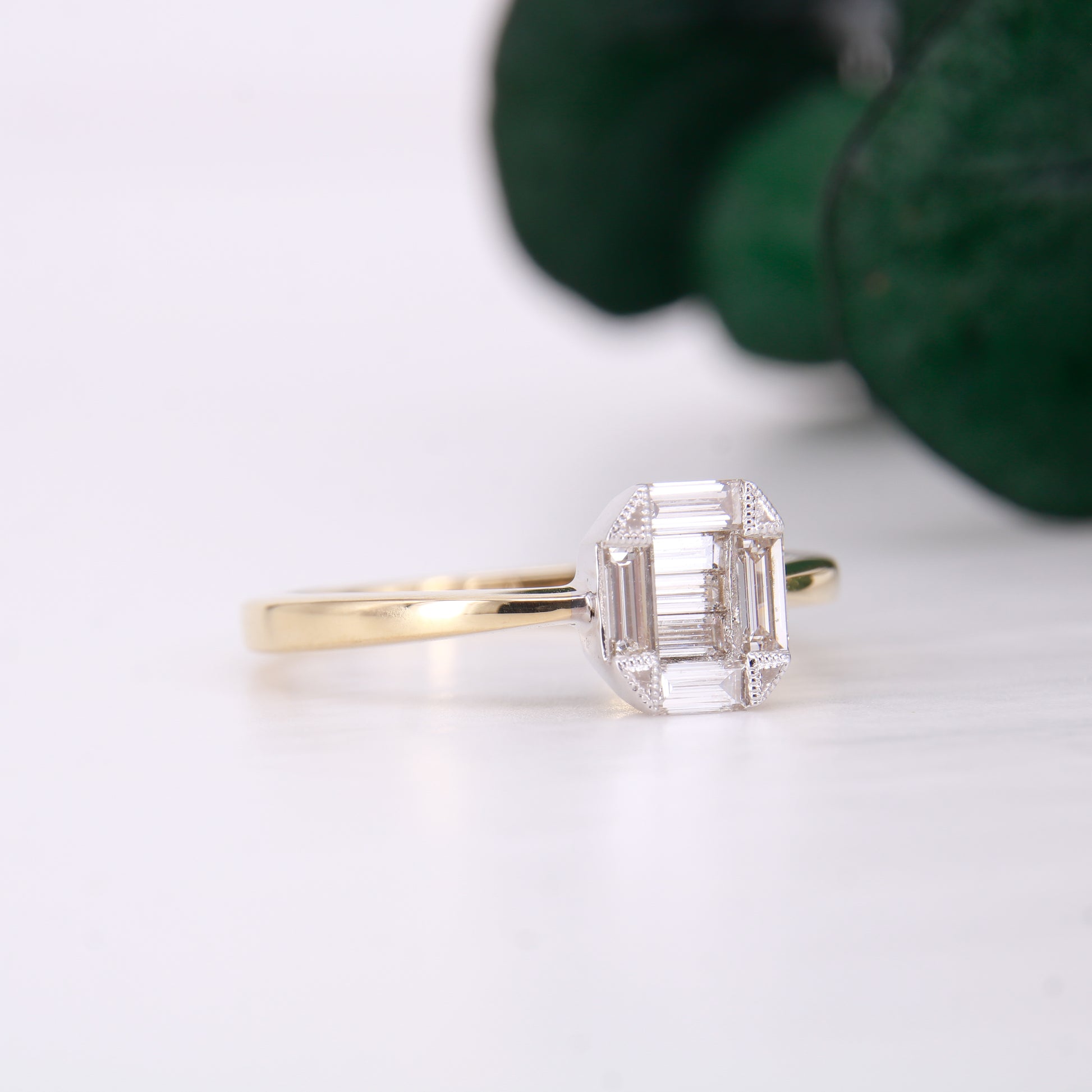 Pre-Owned baguette cut diamond cluster ring, featuring 7 stunning baguette cut diamonds set in a hexagonal shape. Perfect as a vintage inspired engagement ring.